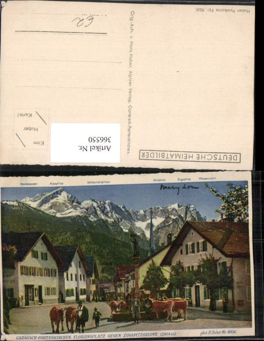 366550,Garmisch-Partenkirchen Floriansplatz Brunnen Bergkulisse pub Foto H. Huber 8036