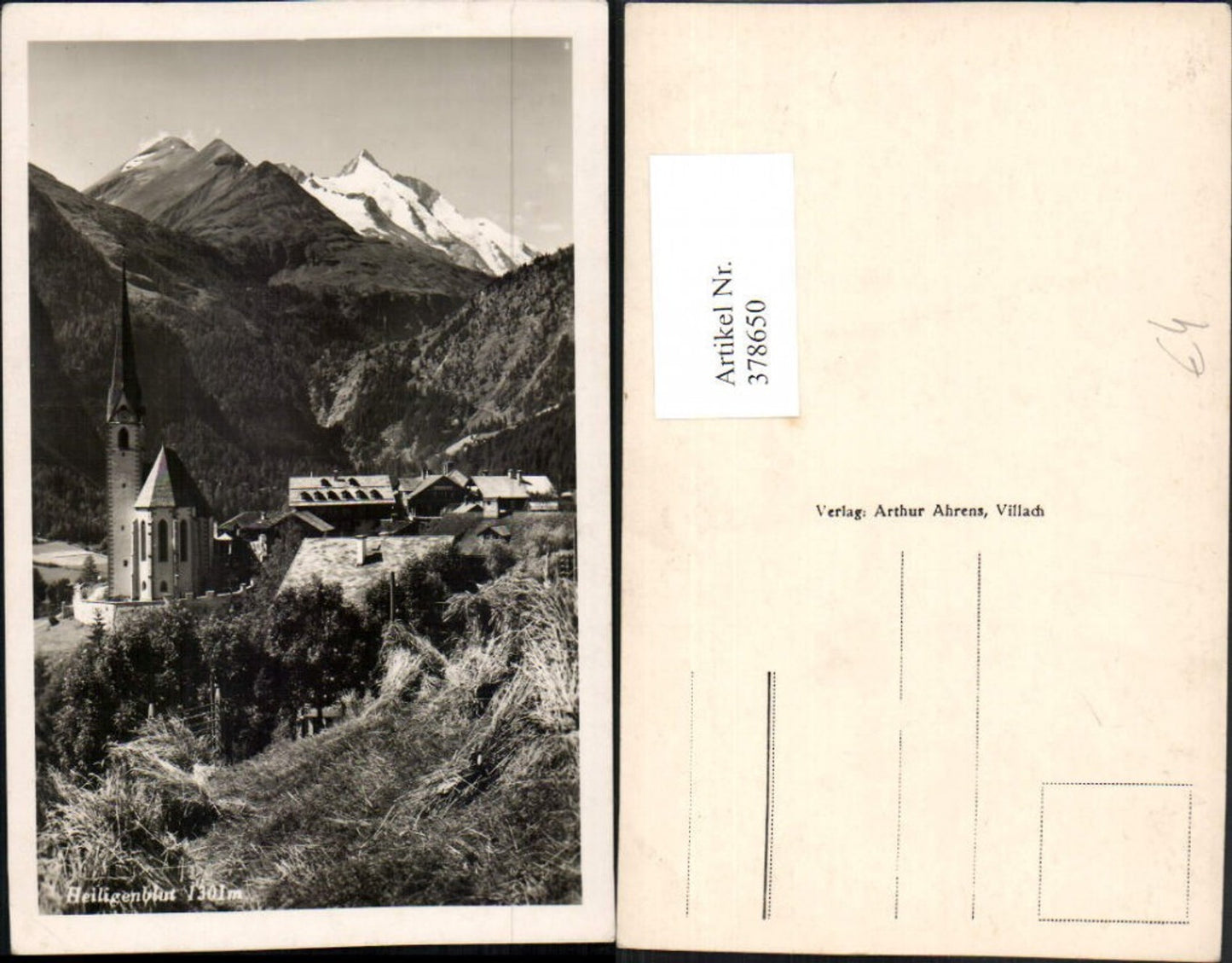 378650,Heiligenblut Teilansicht Kirche Bergkulisse