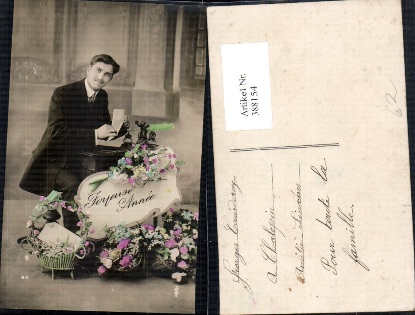 388154, Man in suit, basket with flowers, desk