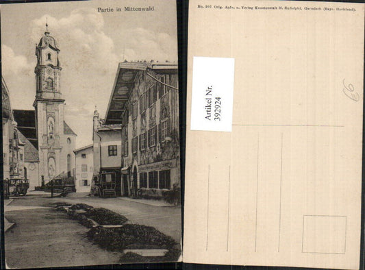392924,Mittenwald Straßenansicht Gasthaus Alpenrose Kirche