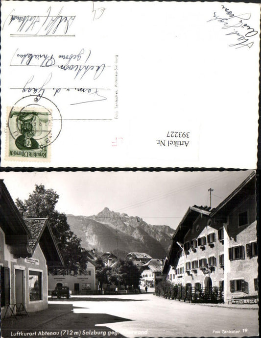 393227,Abtenau Straßenansicht Gemeindeamt Uhrmacher geg. Wieswand Bergkulisse