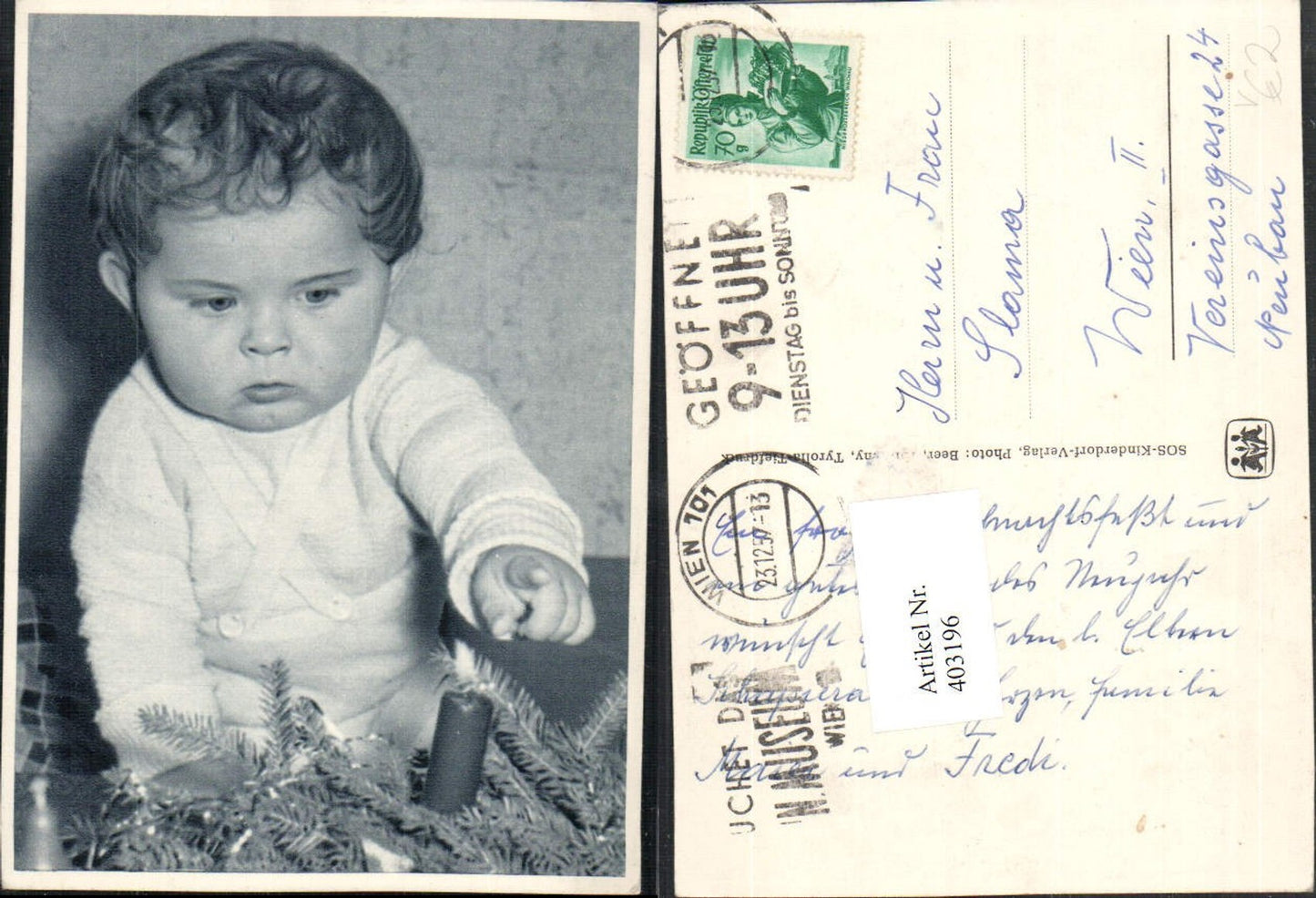 403196,SOS Kinderdorf Kind Tannenzweige Kerze