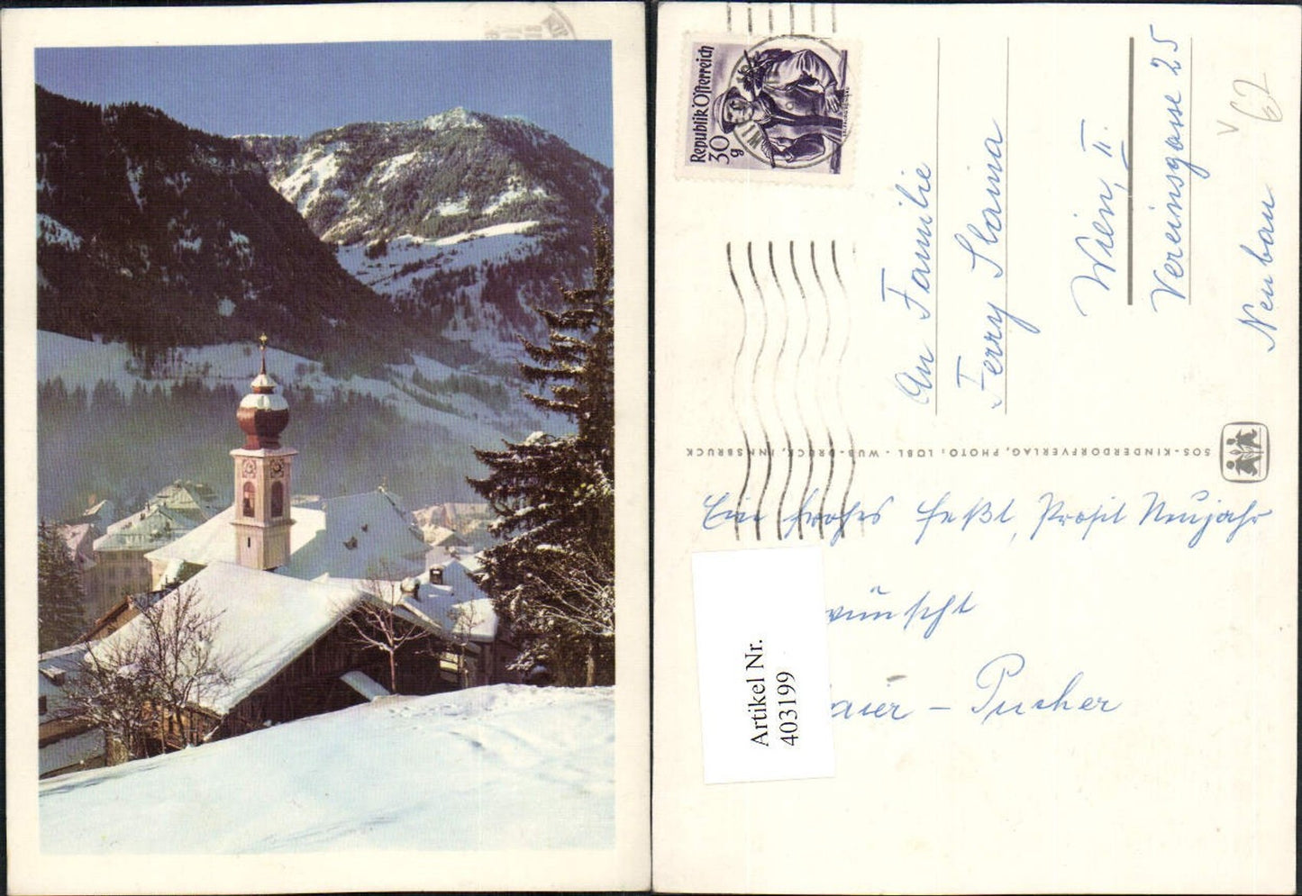 403199,SOS Kinderdorf Dorf Kirche Bergkulisse Winterbild
