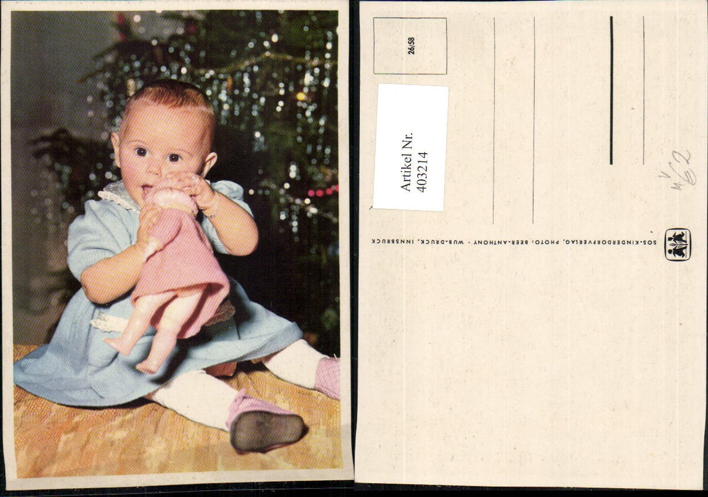 403214,SOS Kinderdorf 26/58 Kind beißt in Puppe Weihnachtsbaum