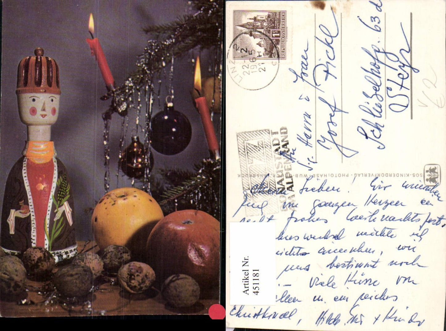 451181,SOS-Kinderdorf Weihnachten Nüsse Äpfel Kerzen Figur