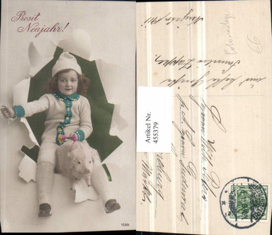 455379,Neujahr Fotomontage Kind Haube Ferkel Zerrissenes Papier