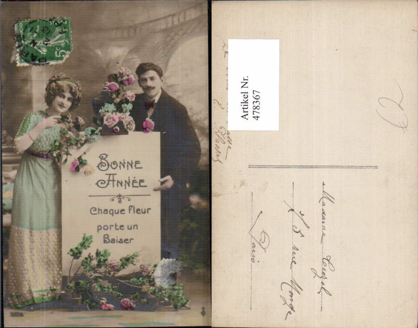 478367, Couple with sign Bonne Anne Flowers Love