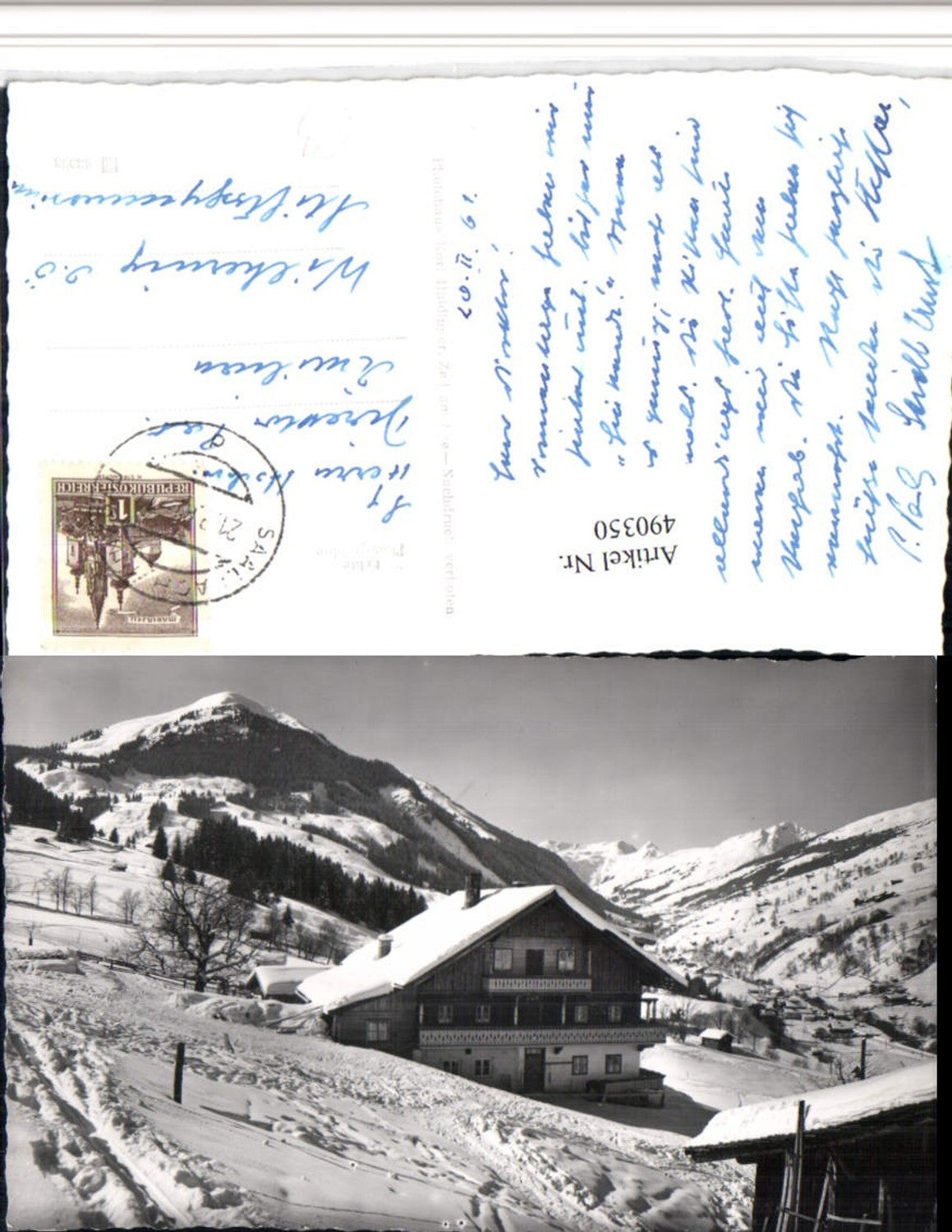 490350,Saalbach Teilansicht Haus Bergkulisse Winterbild