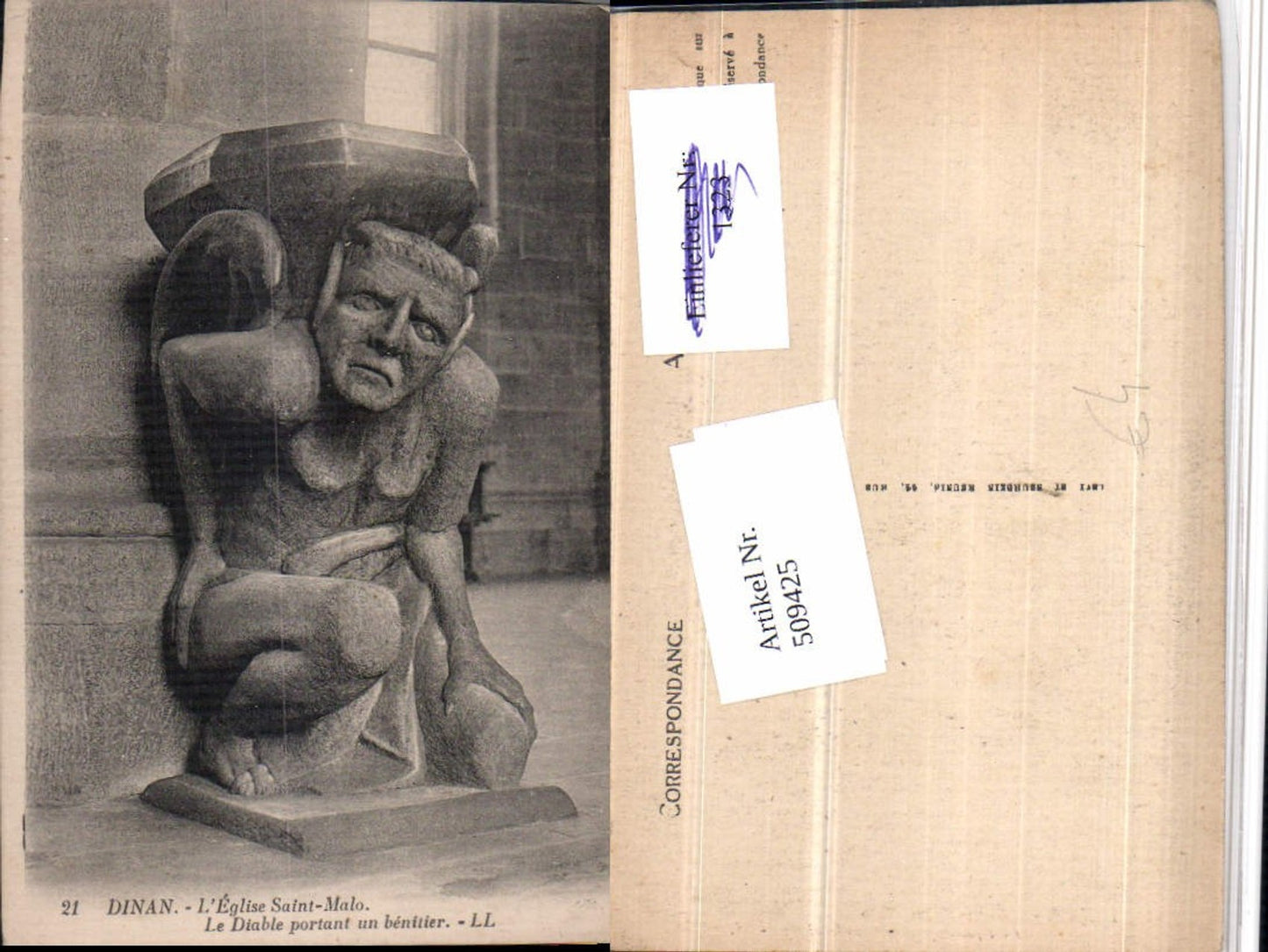509425,Dinan Eglise Saint-Malo Diable portant un benitier Statue