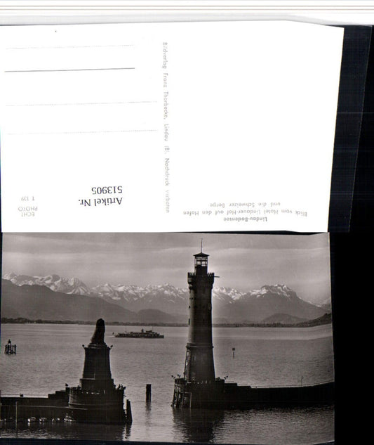 513905,Lindau im Bodensee Hafen Leuchtturm Bergkulisse
