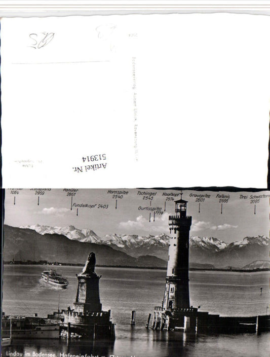 513914,Lindau im Bodensee Hafeneinfahrt Leuchtturm Bergkulisse