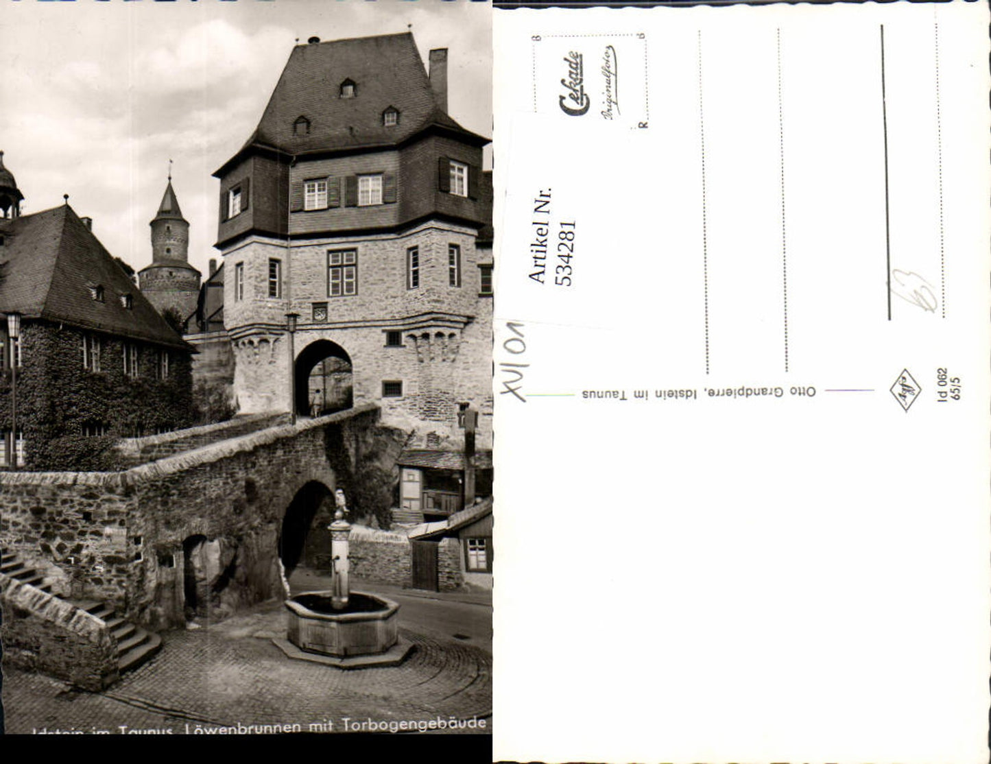 534281,Foto Ak Idstein i. Taunus Löwenbrunne m. Torbogengebäude Brunnen