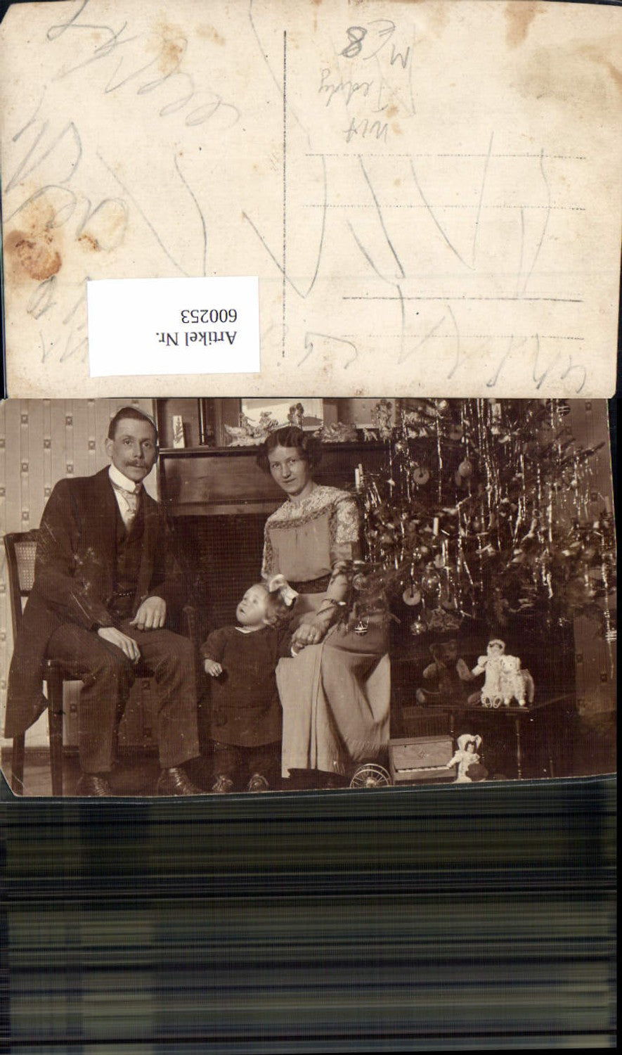 600253,Familieportrait Familie Kind Teddy Christbaum Weihnachtsbaum Spielzeug