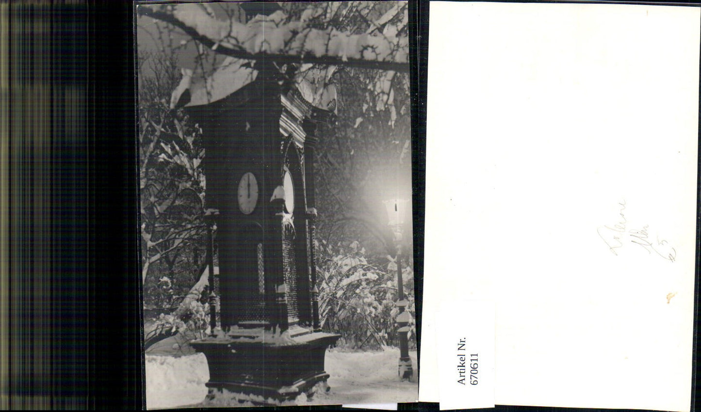670611,Foto Laterne Uhr im Winter b. Nacht