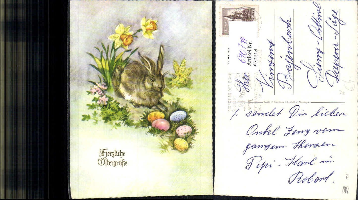 670714,Künstler Ak Hase mit Blumen Narzissen Bunte Eier Osterhase Ostern Bahnpost