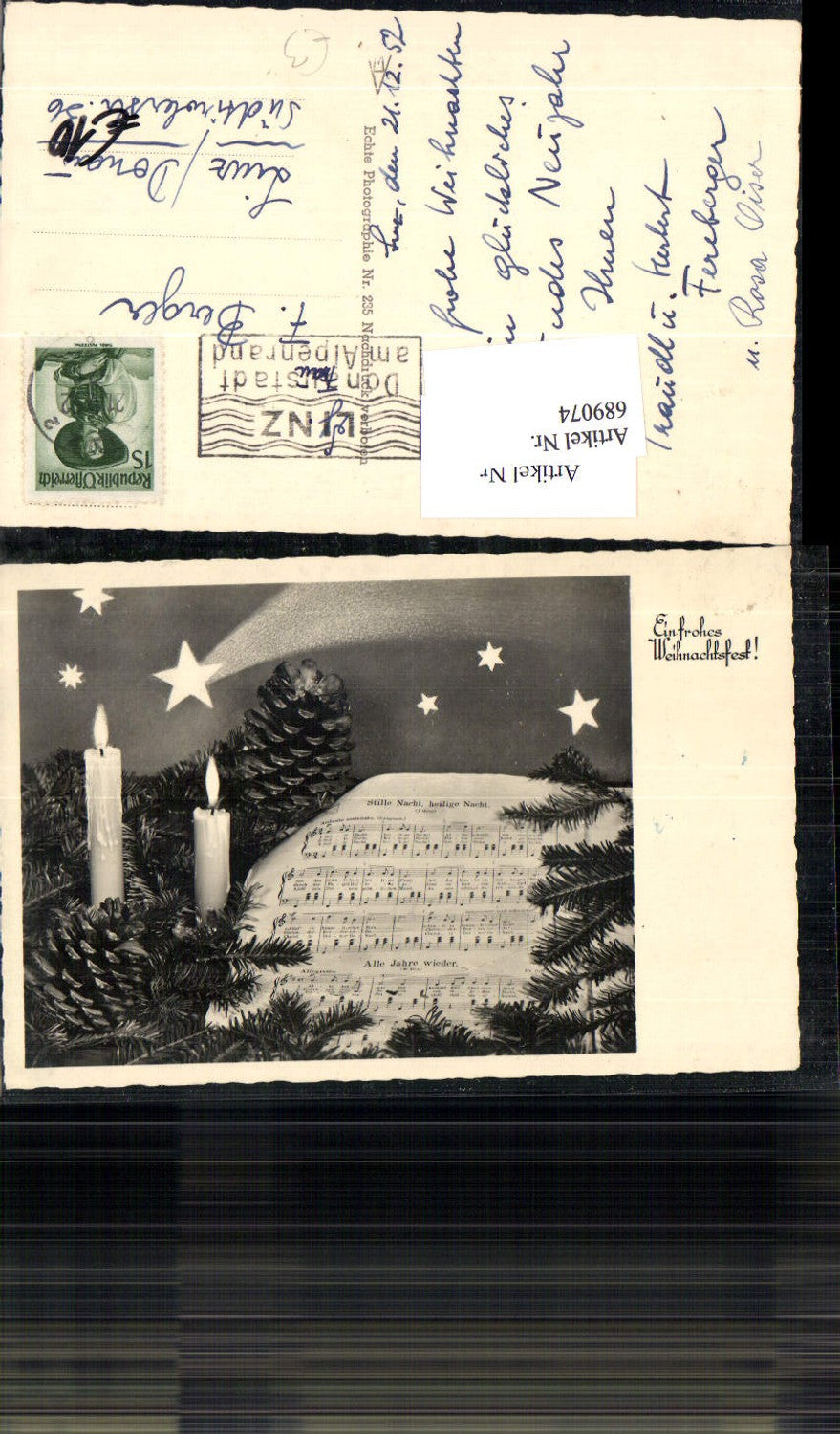 689074 Weihnachten Kerzen Zapfen Tannenzapfen Tannenzweig Notenblatt